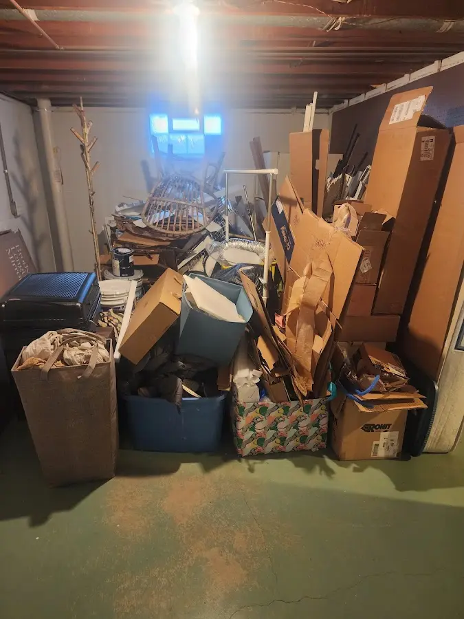 Roll-off dumpster container at job site for 15 Yard Dumpster Rental in Fredericktown